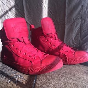 Red Hightop all star converse.